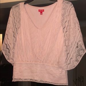 Soft Pink lace with tank underneath.